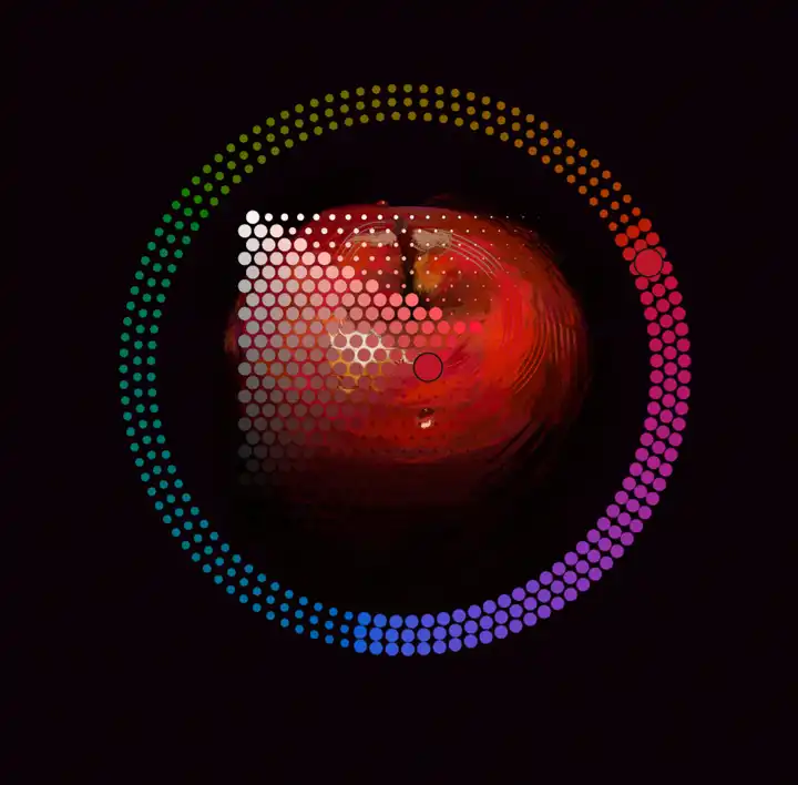Cozy Paint Studio circular color picker directly over a painted red apple